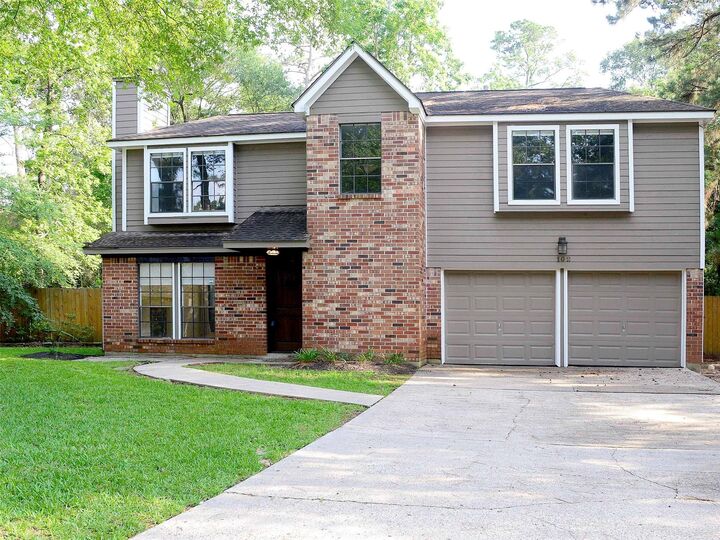 Property Photo:  102 E Mistybreeze Circle  TX 77381 