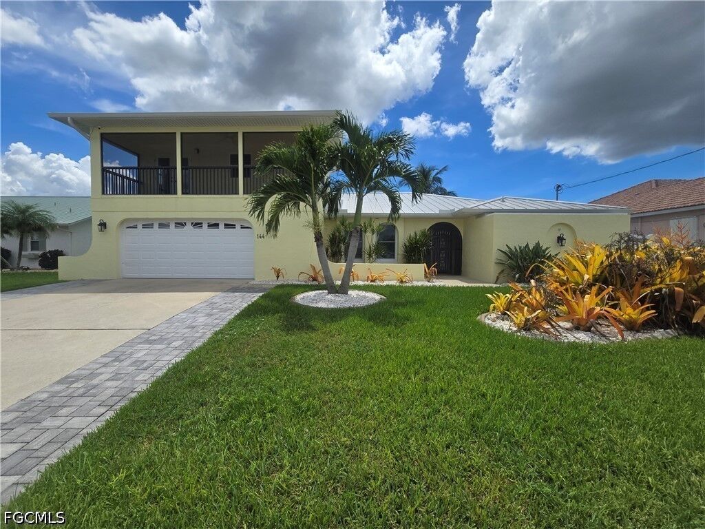 Property Photo:  144 SW 38th Terrace  FL 33914 