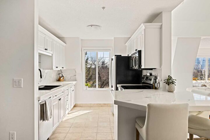 Property Photo:  1110 5 Avenue NW 305  AB T2N 0R6 