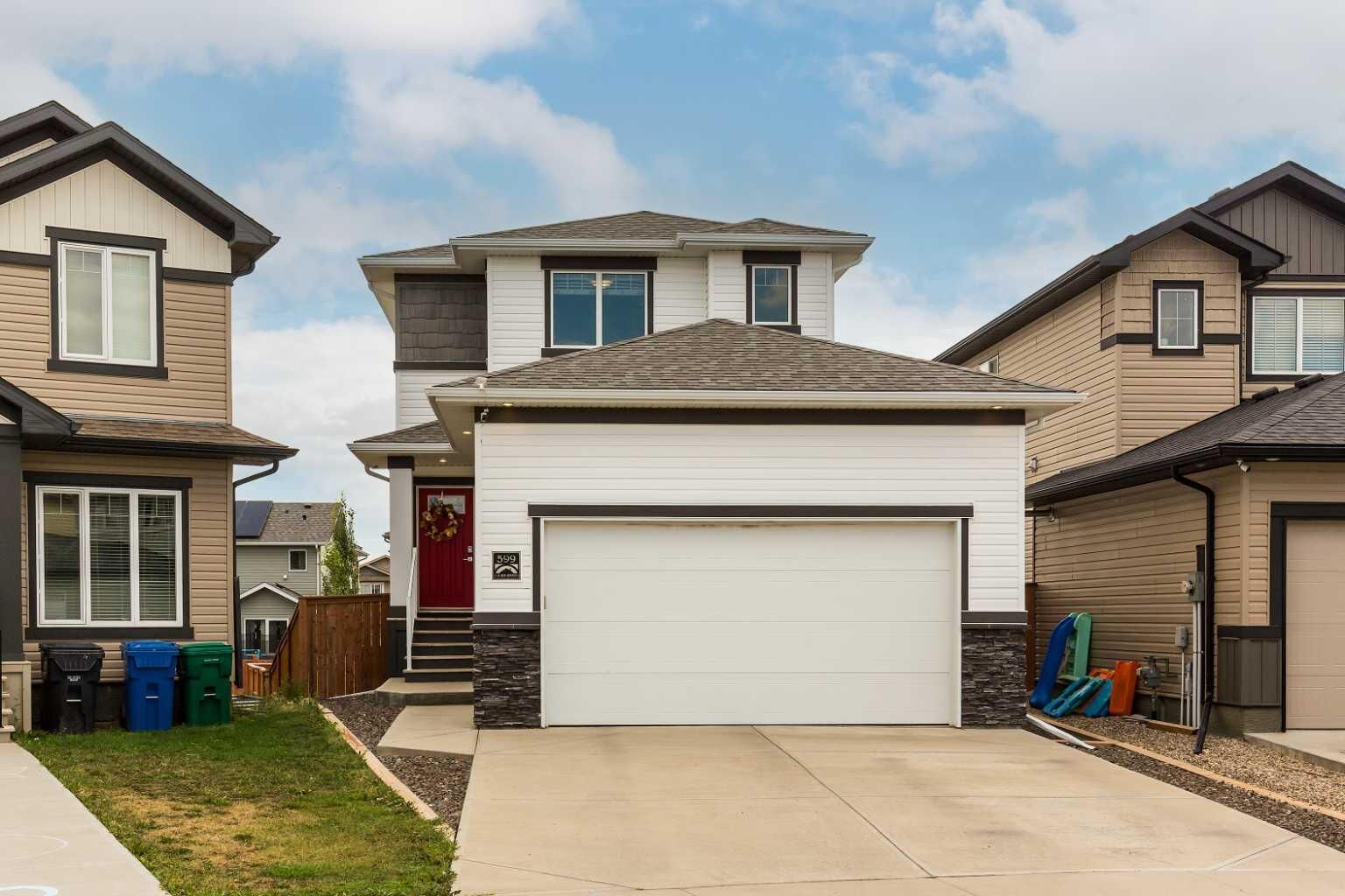 Property Photo: 599 Moonlight Lane W AB T1J 5M1