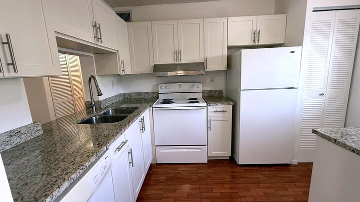Property Photo:  114 NW 60th Avenue 3-1  FL 33063 