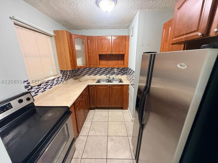 Property Photo:  525 W 69th St 106  FL 33014 