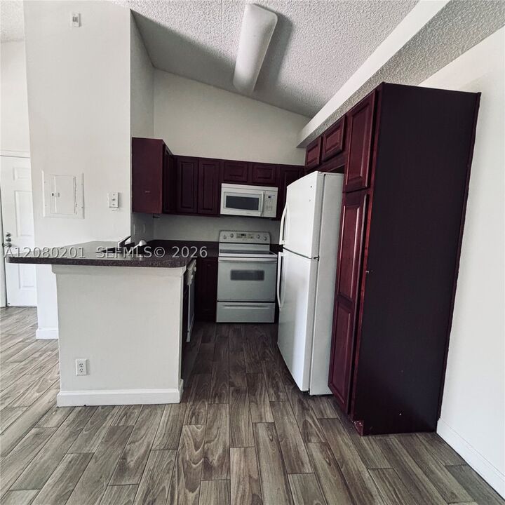 Property Photo: 701 Lyons Rd 13207 FL 33063