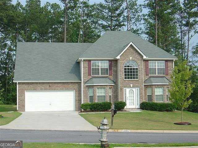 Property Photo:  4202 Fortune Point  GA 30349 