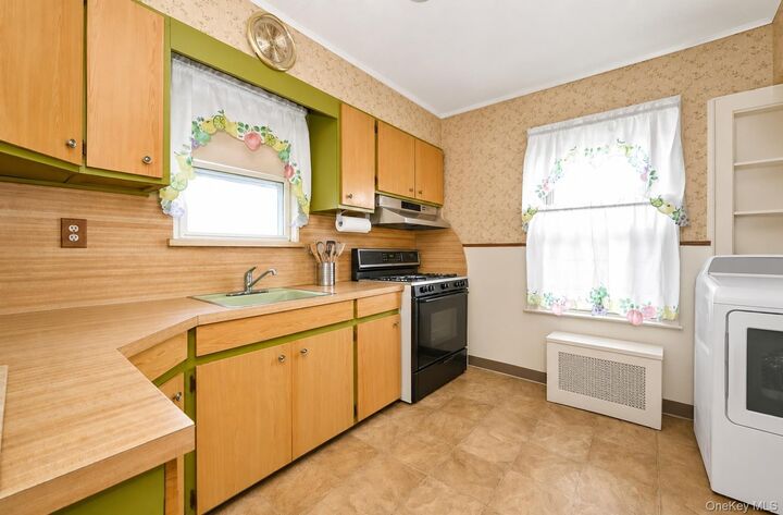 Property Photo:  114-31 210th Street  NY 11411 