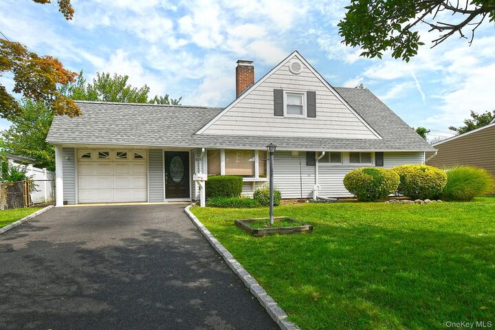 Property Photo: 5 Woodcock Lane NY 11756