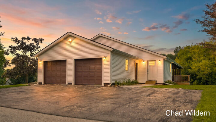Property Photo:  7200 Knapp Street NE  MI 49301 