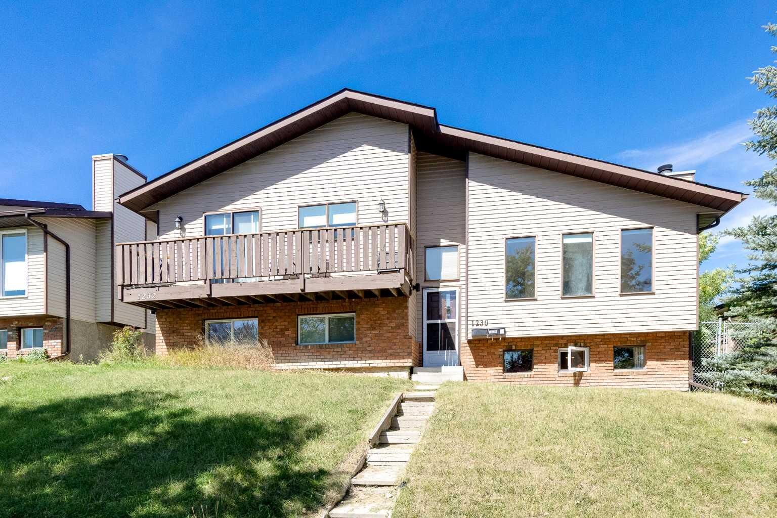 Property Photo:  1230 Berkley Drive NW  AB T3K 1S9 