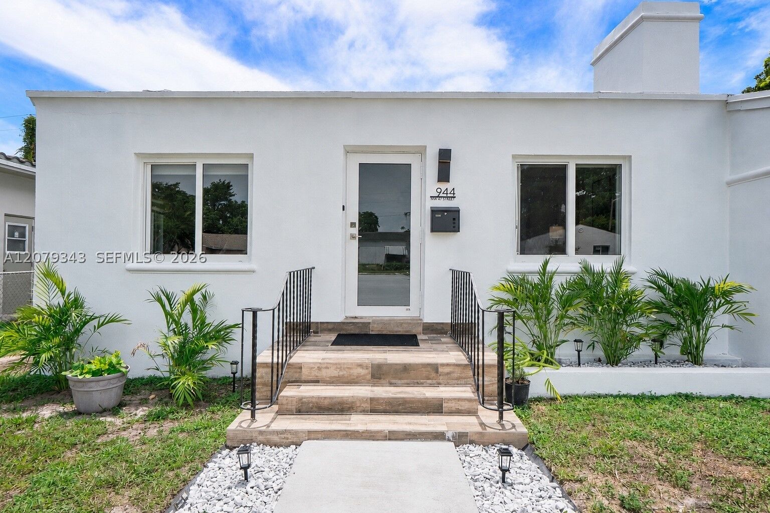 Property Photo:  944 NW 47th St  FL 33127 