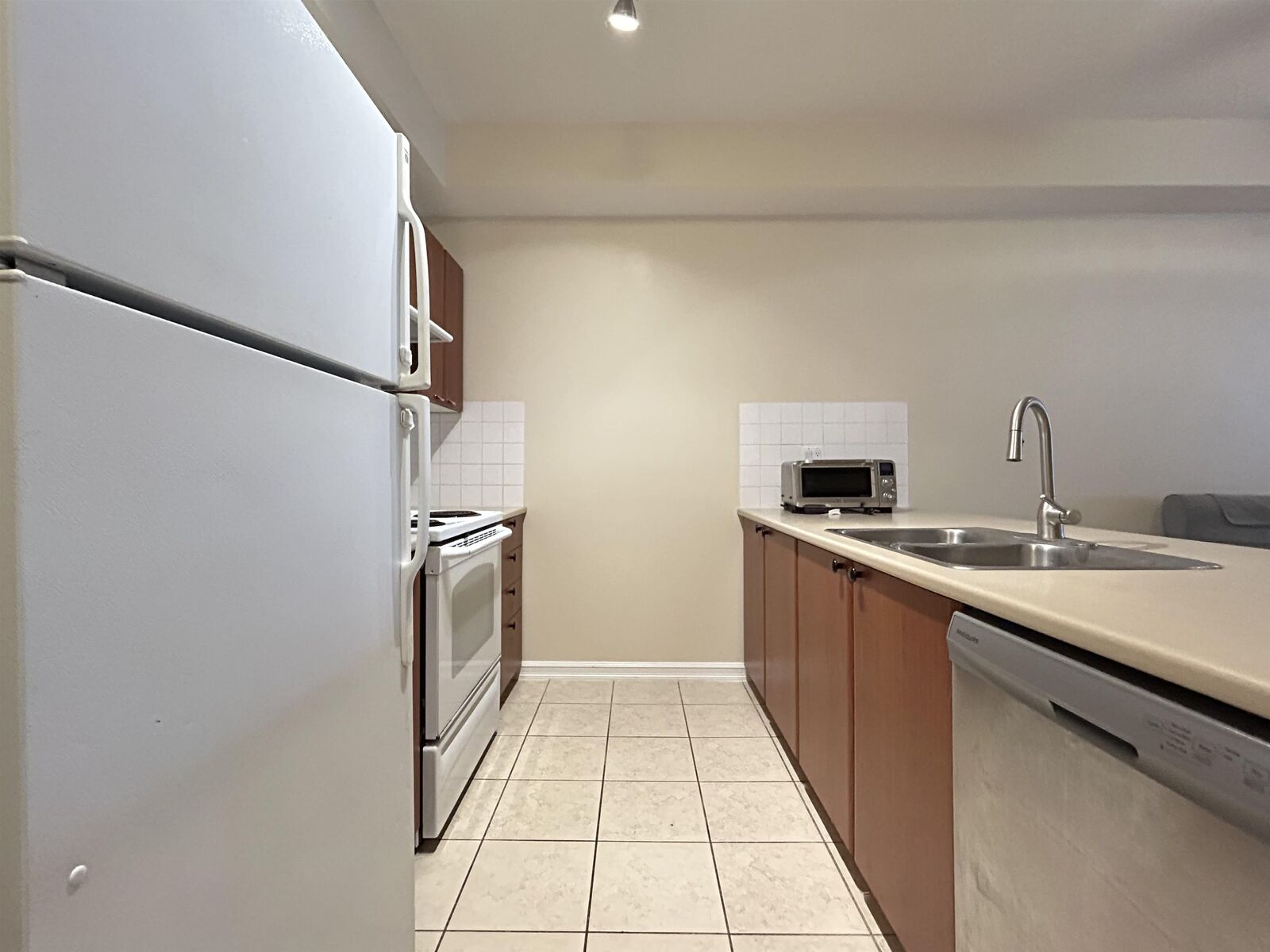 Property Photo:  10088 148 Street 411  BC V3R 3M9 