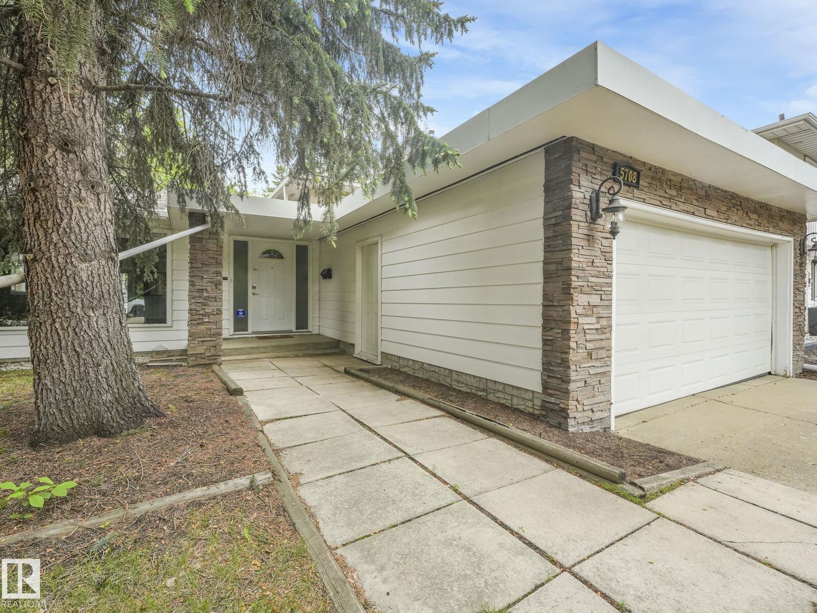Property Photo: 5708 144 Street NW AB T6H 4H4