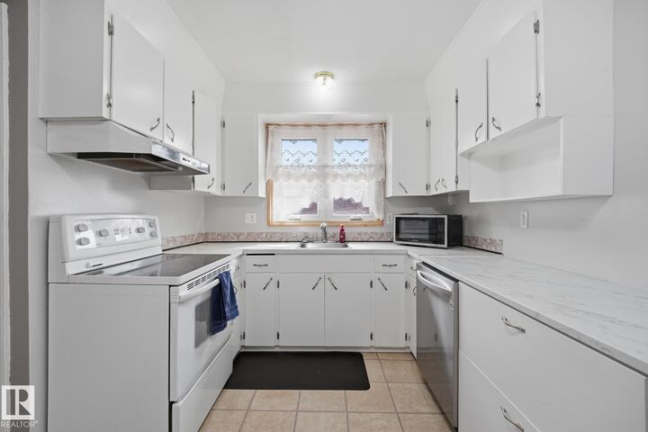 Property Photo:  13304 63 Street NW  AB T5A 0X1 
