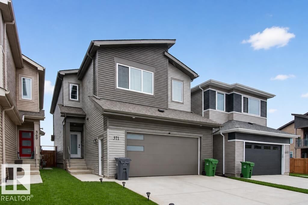 Property Photo: 371 Bluff Cv AB T9E 1M9