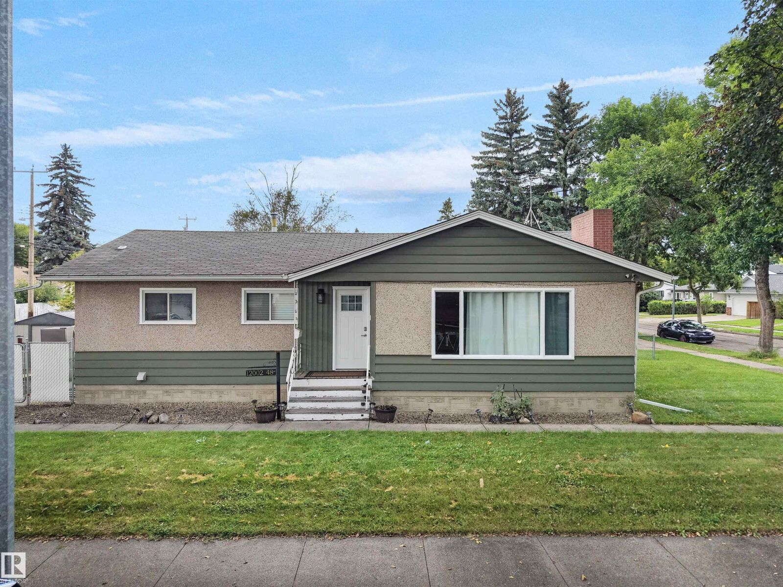 Property Photo:  12002 48 Street NW  AB T5W 2Y8 