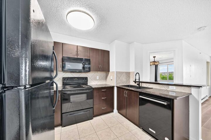 Property Photo: 60 Panatella Street NW 2410 AB T3K 0M2