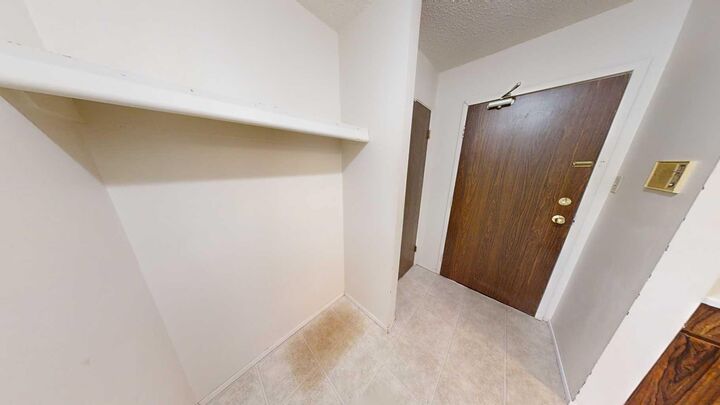 Property Photo: 9656 Hillcrest Drive 301 AB T8V 1B1