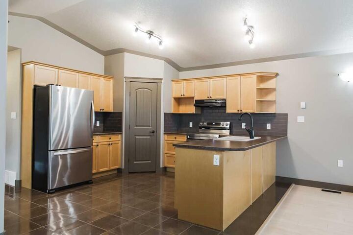 Property Photo:  11214 75A Avenue  AB T8W 0G5 