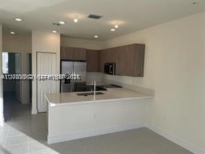Property Photo: 6453 NW 102nd Path 301 FL 33178