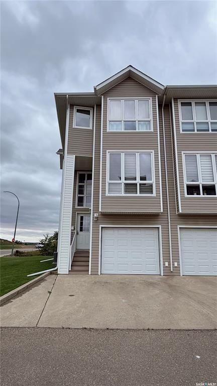 Property Photo:  697 Sun Valley Drive 1  SK S4A 2X7 