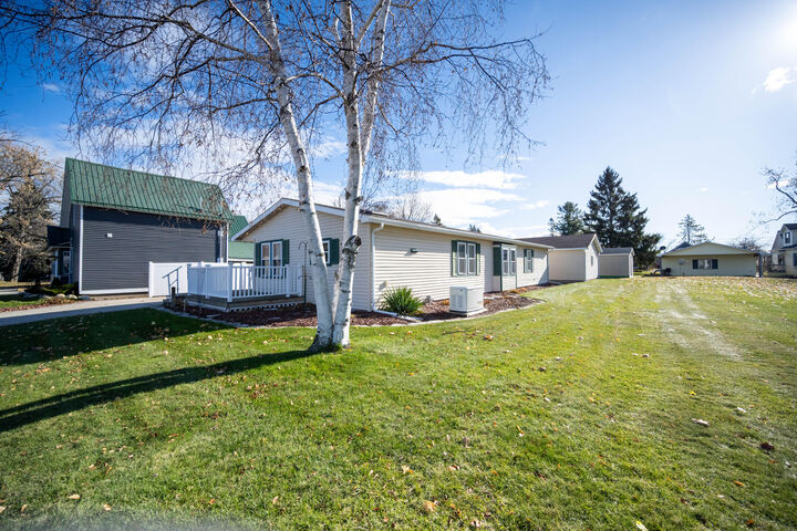 Property Photo:  208 Duncan Avenue  MI 49721 