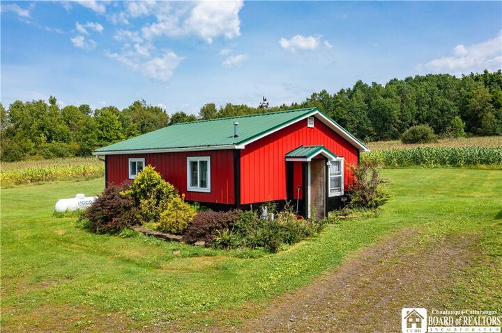 Property Photo:  628 Warren Road  NY 14738 