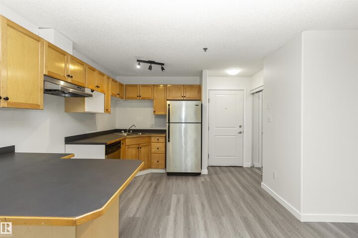 Property Photo:  2305 35A Avenue NW 103  AB T6T 1Z2 