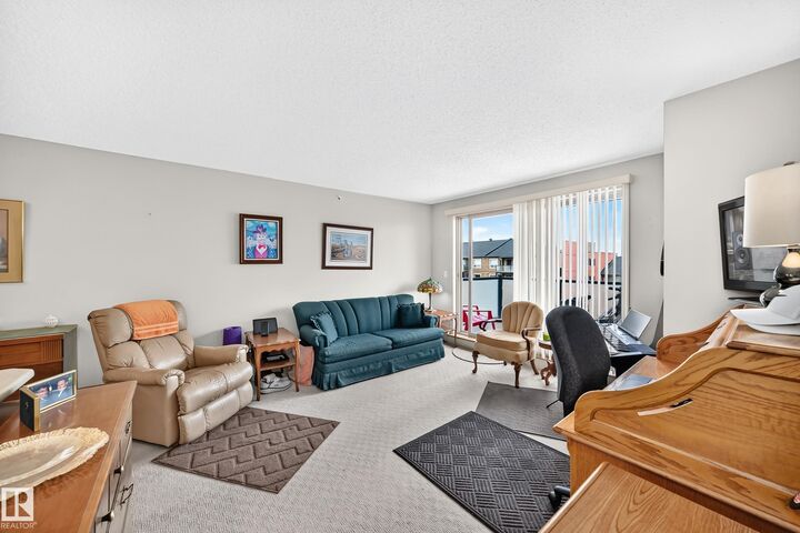 Property Photo:  13907 136 Street NW 418  AB T6V 1Y5 