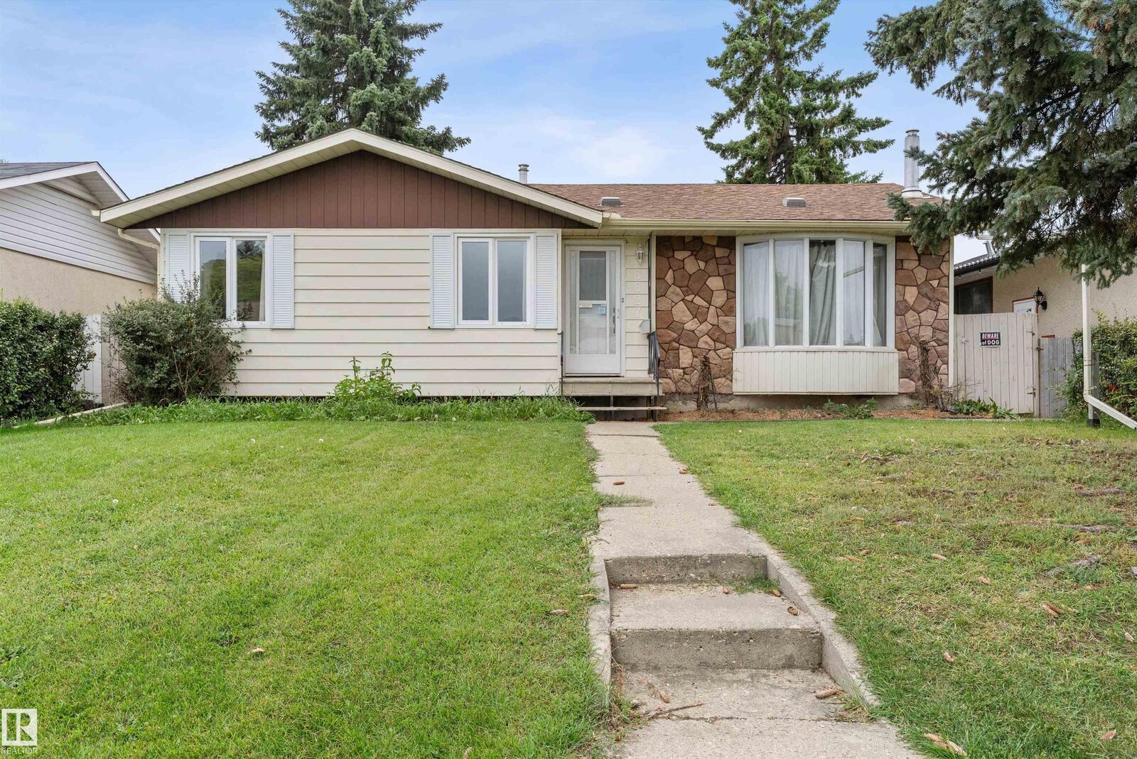 Property Photo:  8827 138 Avenue NW  AB T5E 2A7 