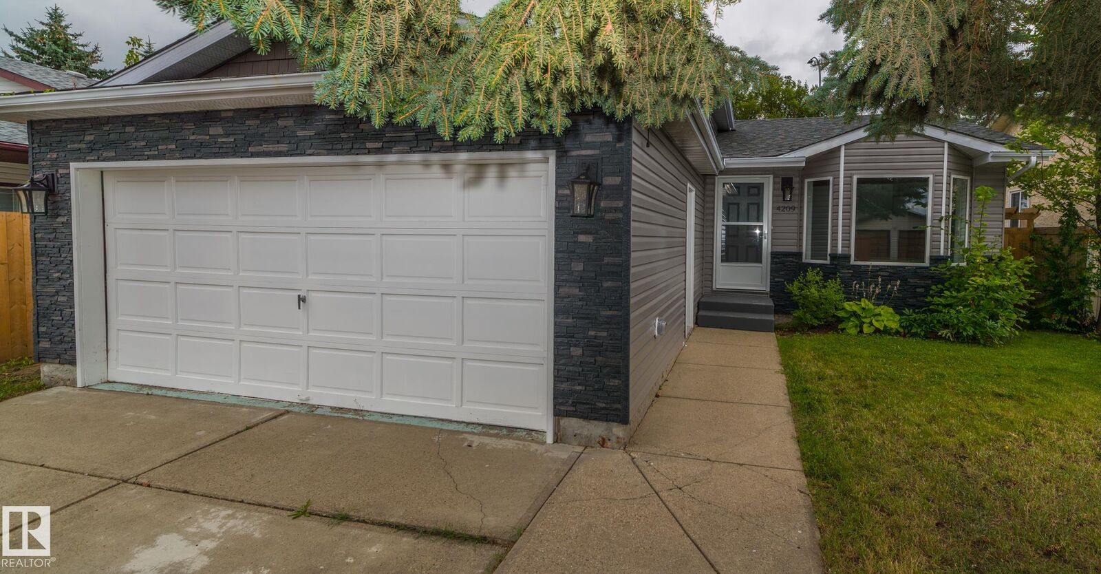Property Photo:  4209 25 Avenue NW  AB T6L 6B4 