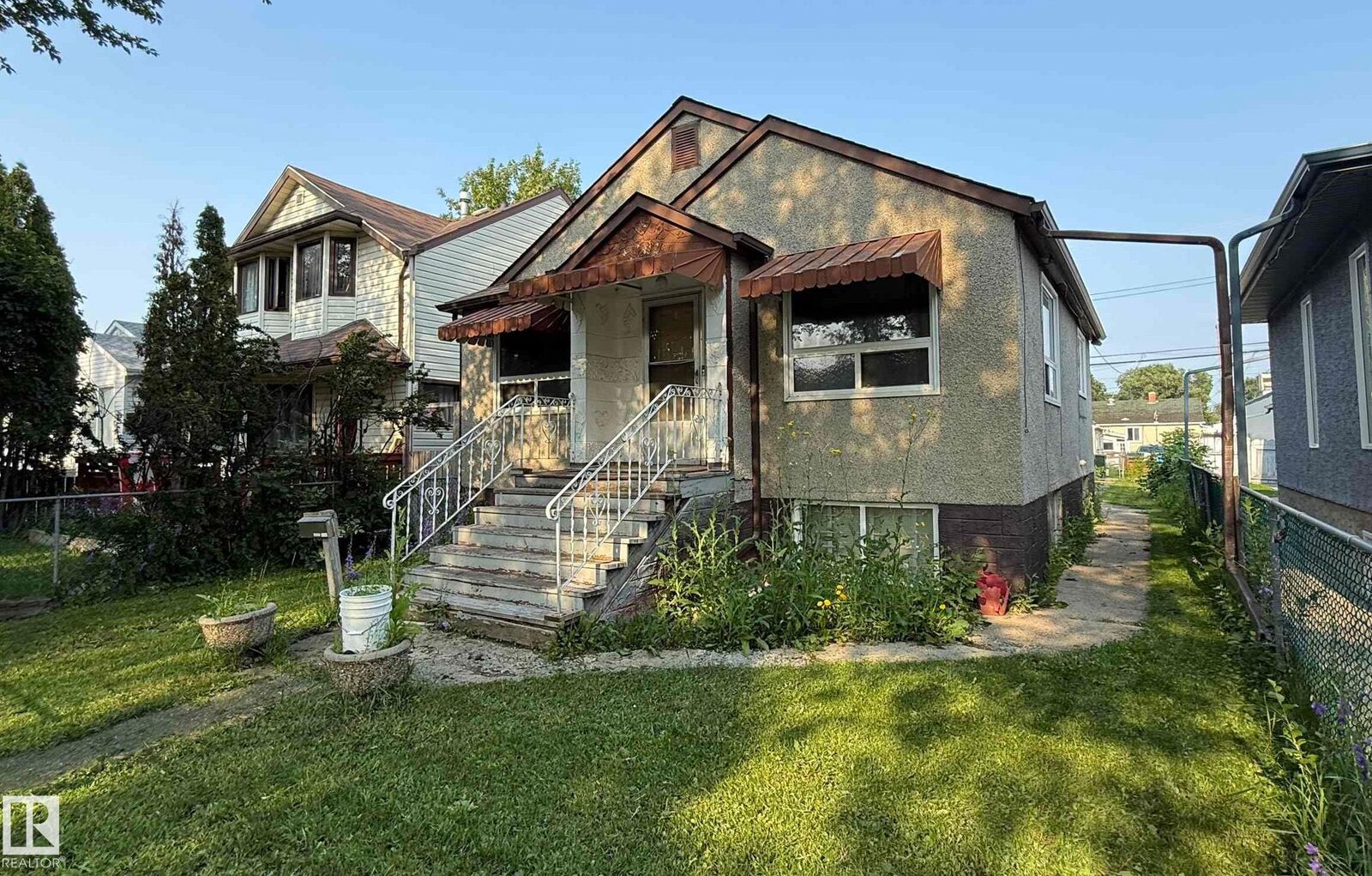 Property Photo:  11825 67 Street NW  AB T5B 1L9 
