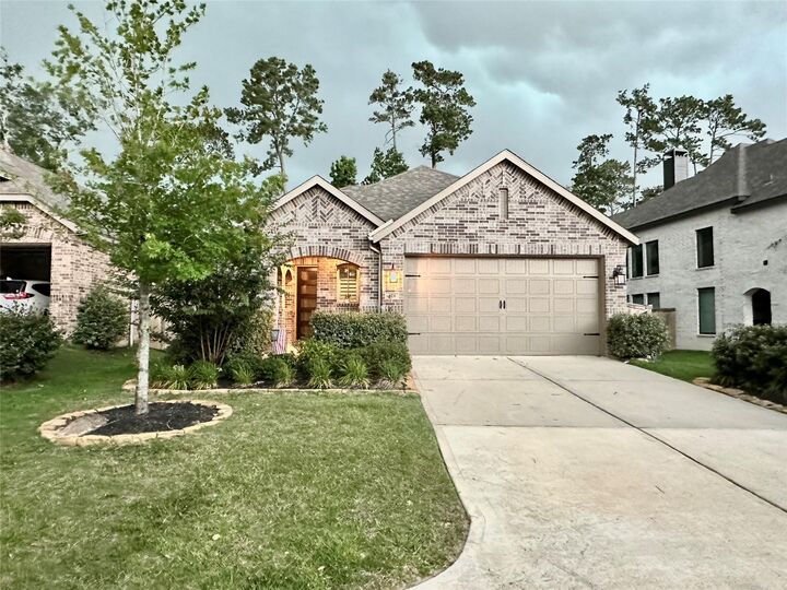 Property Photo: 420 Flowering Lotus Court TX 77318