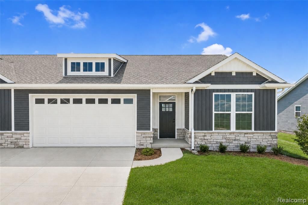 Property Photo:  336 McDowell Drive  MI 48843 