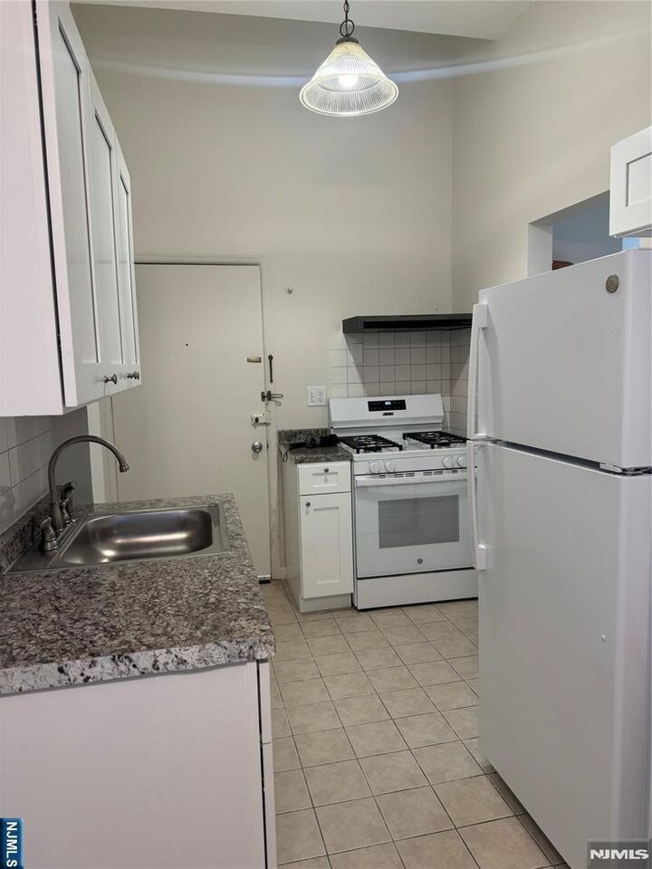 Property Photo: 100 S Washington Avenue 1 NJ 07621