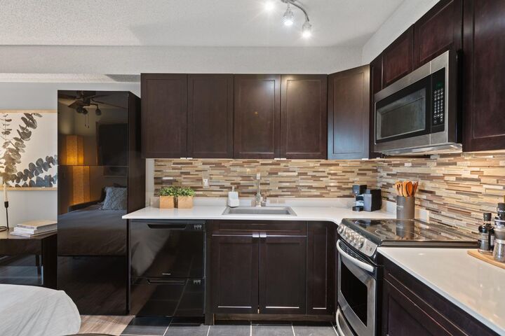 Property Photo:  1620 70 Street SE 4409  AB T2A 7Z2 