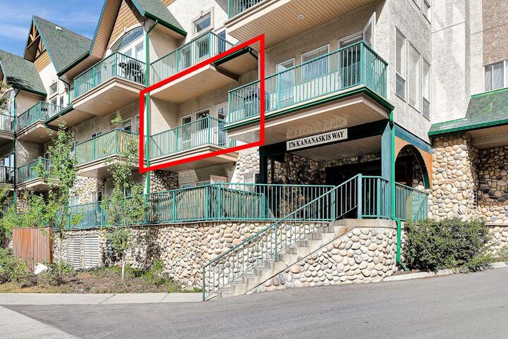 Property Photo: 176 Kananaskis Way 201 AB T1W 3E4