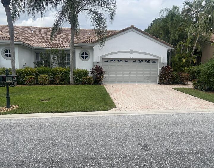 Property Photo: 4638 Carlton Golf Drive FL 33449