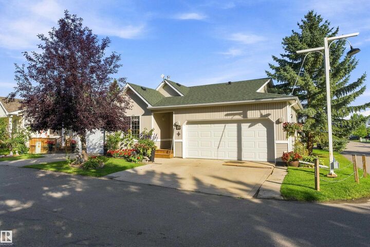 Property Photo:  1 Village Lane 20  AB T0C 2V0 