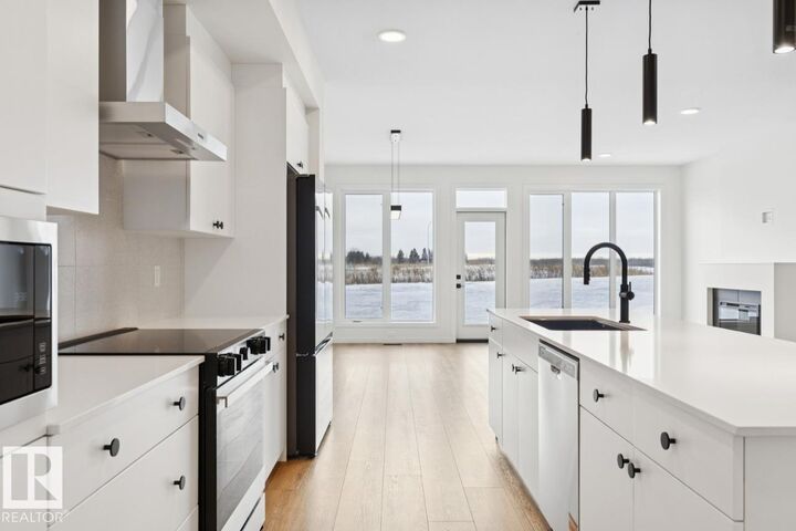 Property Photo:  1566 Keswick Drive SW  AB T6W 5R8 