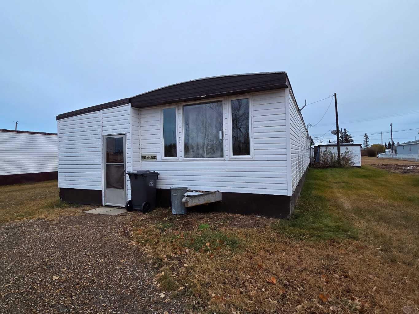 Property Photo:  5107, 5113, 5117 51 Avenue  AB T0H 0E0 