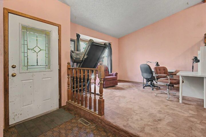 Property Photo:  32 Deersaxon Circle SE  AB T2J 6R5 