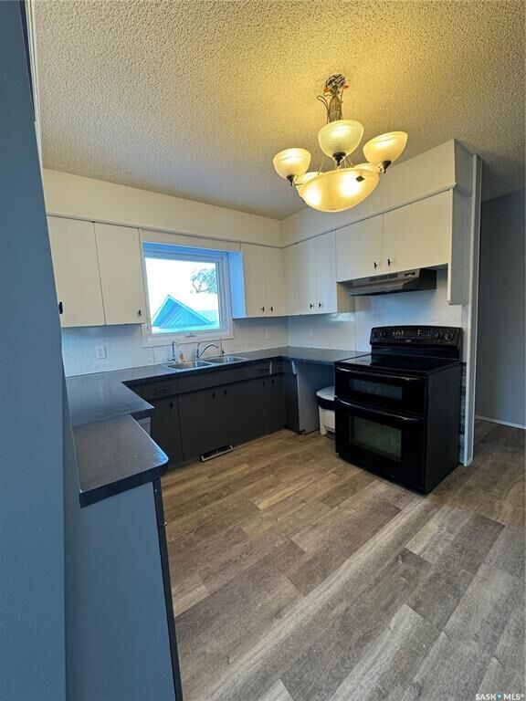 Property Photo:  203 2nd Avenue N  SK S0A 3X0 