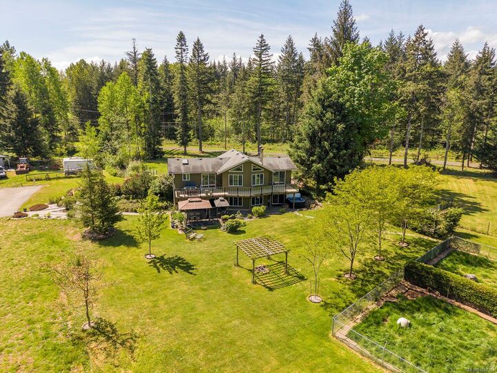 Property Photo:  5427 Wildwood Rd  BC V9J 1P5 