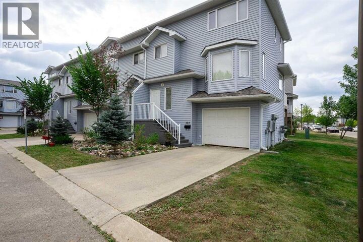 Property Photo:  104 Loutit Road  AB T9K 0A2 