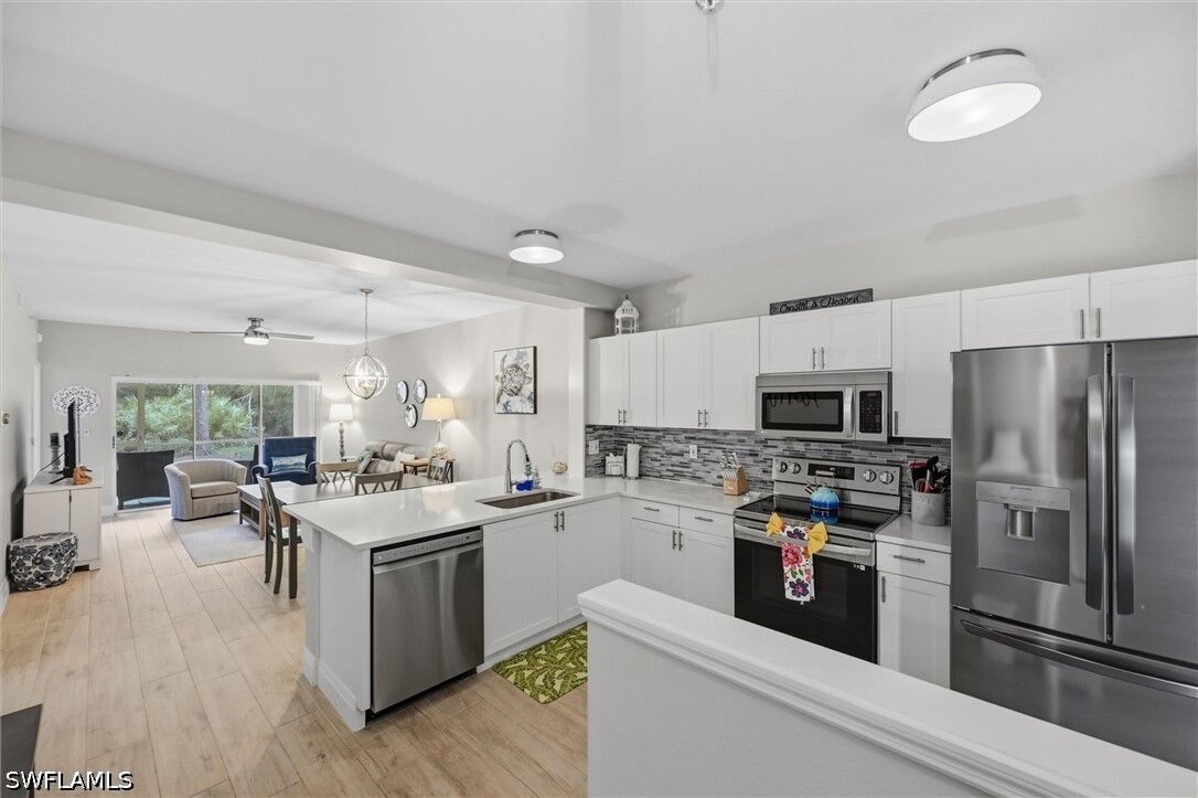 Property Photo: 9165 Celeste Drive 103 FL 34113