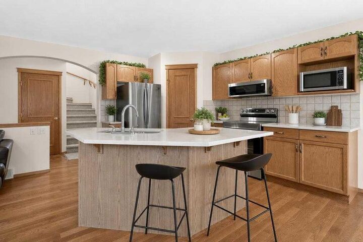 Property Photo:  373 Bridlewood Avenue SW  AB T2Y 4H5 