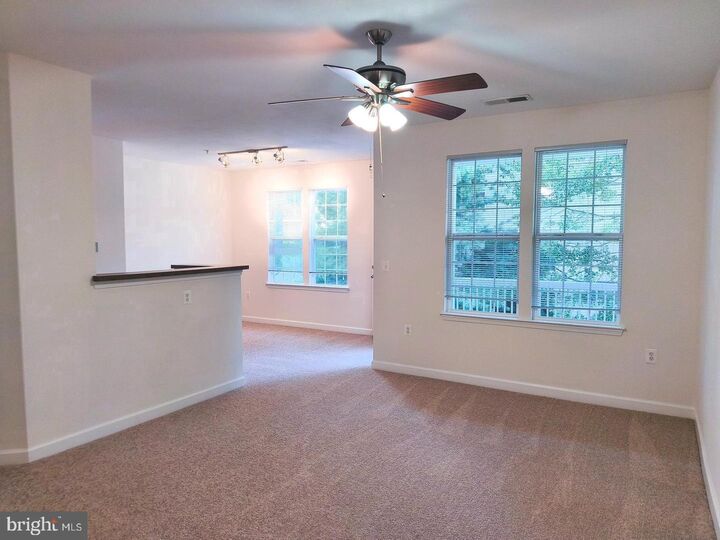 Property Photo:  42492 Mayflower Terrace 203  VA 20148 