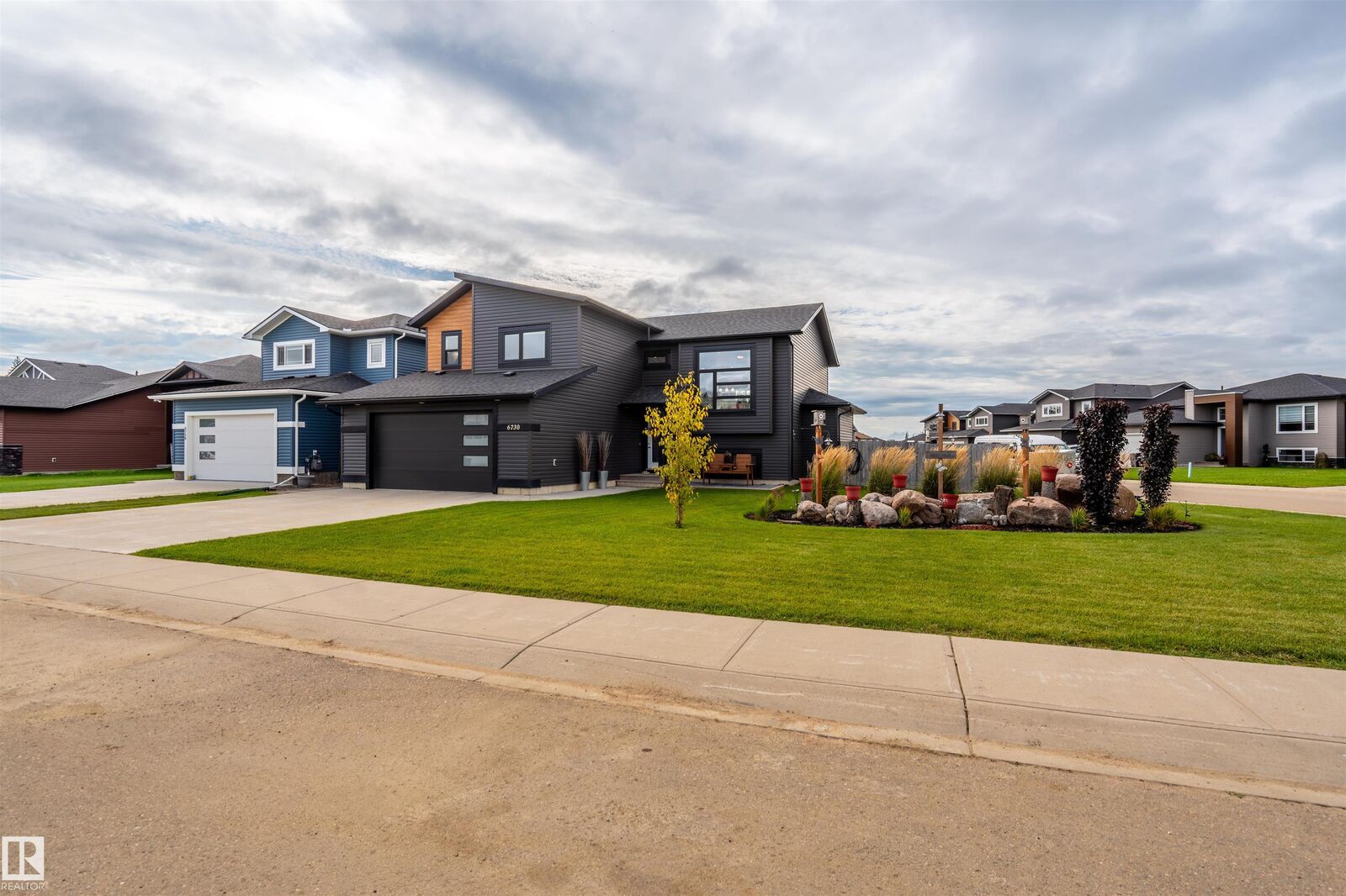 Property Photo:  6730 Tri City Way  AB T9M 0L2 