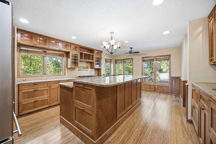 Property Photo:  8031 Tierneys Woods Curve  MN 55438 
