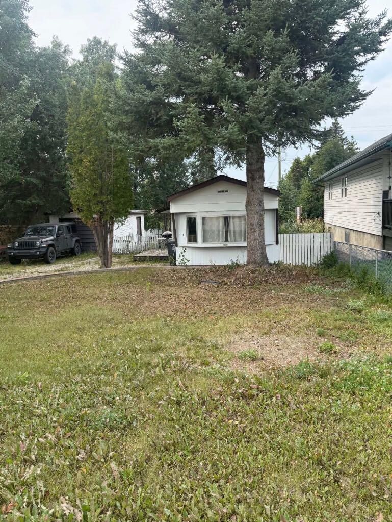 Property Photo:  1107 7 Avenue Avenue N  AB T0H 0C0 