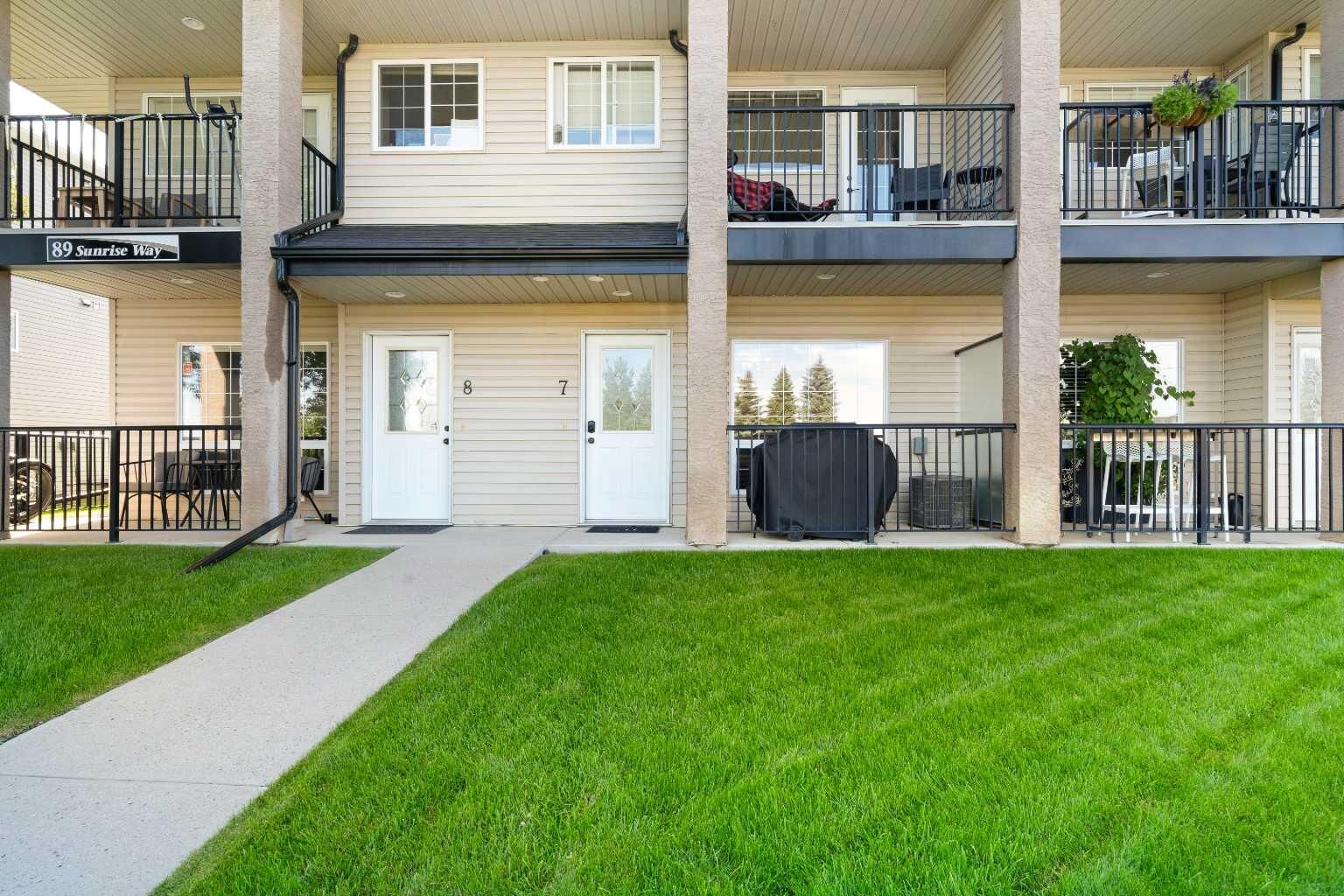 Property Photo:  89 Sunrise Way SW 7  AB T1B 4X9 
